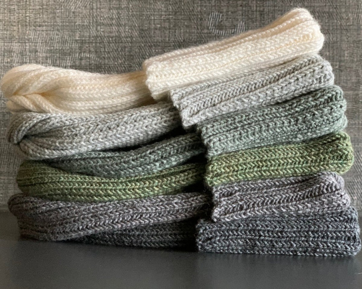 Merino wool beanies knitted in Latvia for spring and autumn
