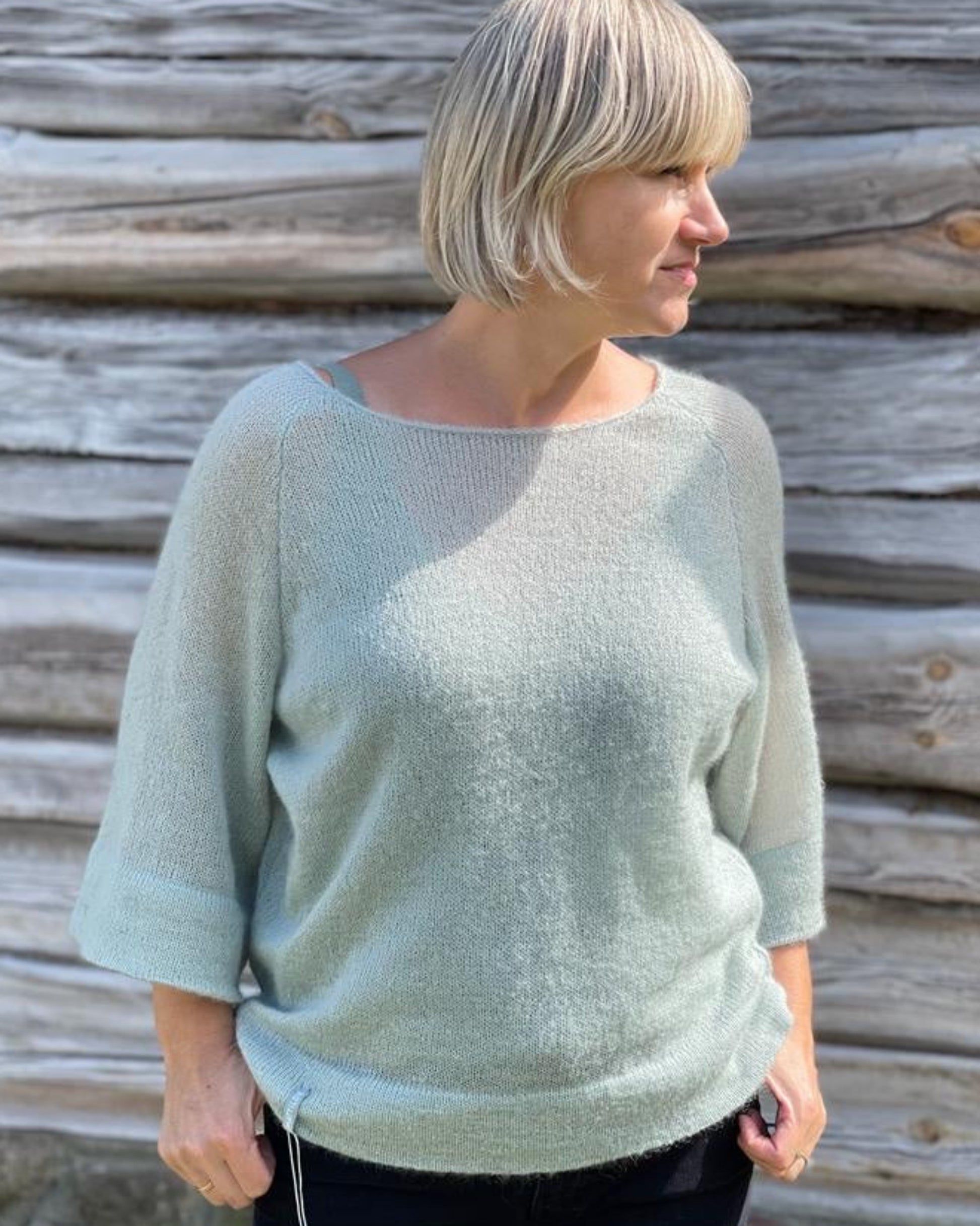 Women’s light green mohair raglan sweater with elbow-length sleeves and double-hem finish