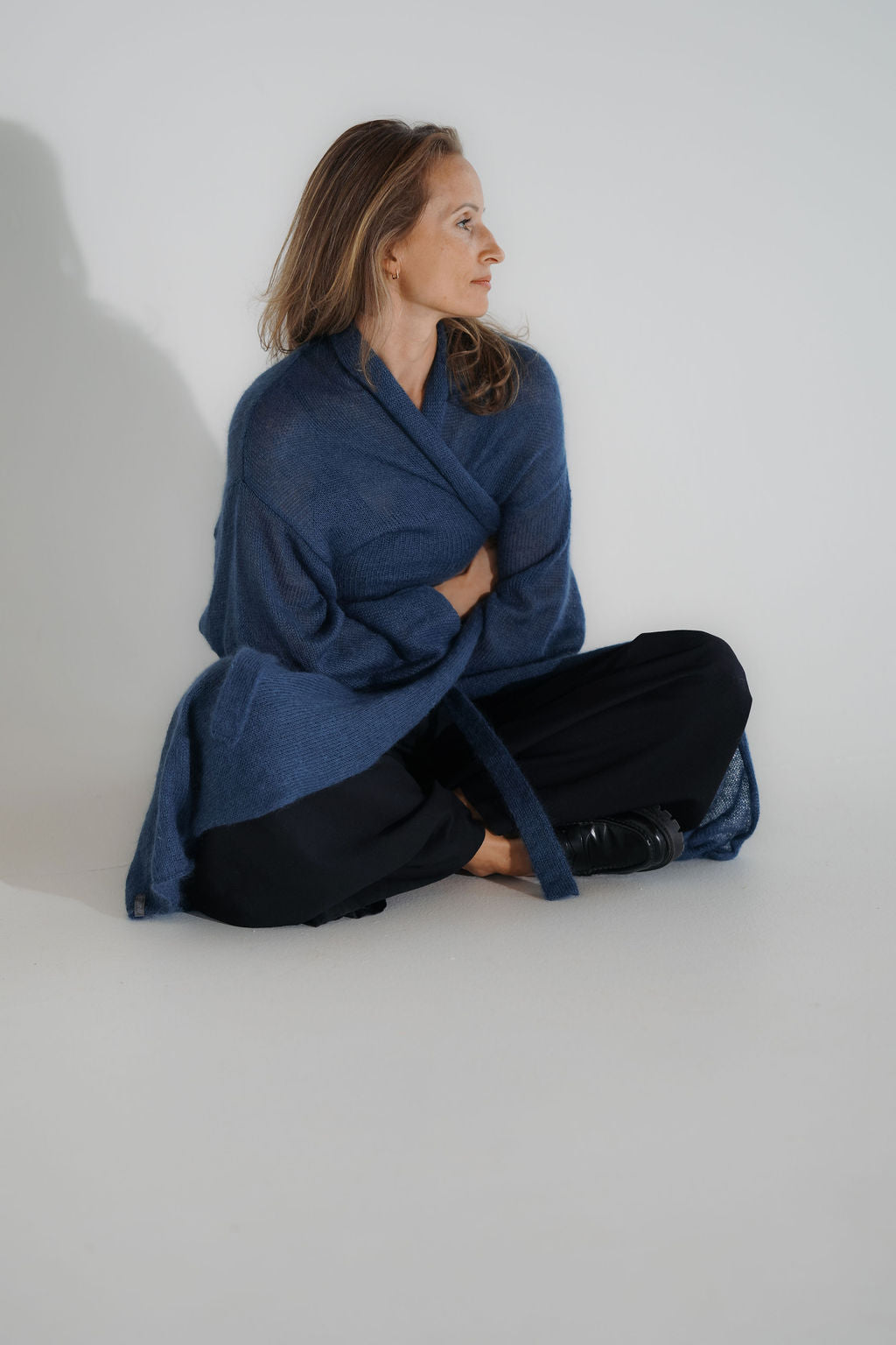 Women’s knitted kid mohair and silk long cardigan with puff sleeves, belt and flowing shape