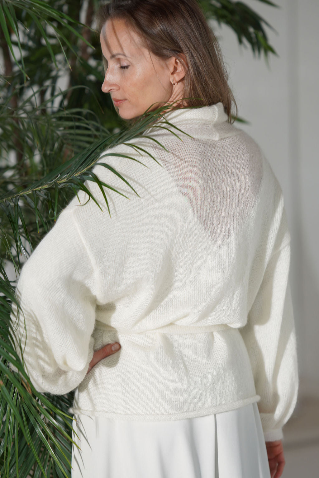 Knitted short mohair cardigan with tie belt, back view