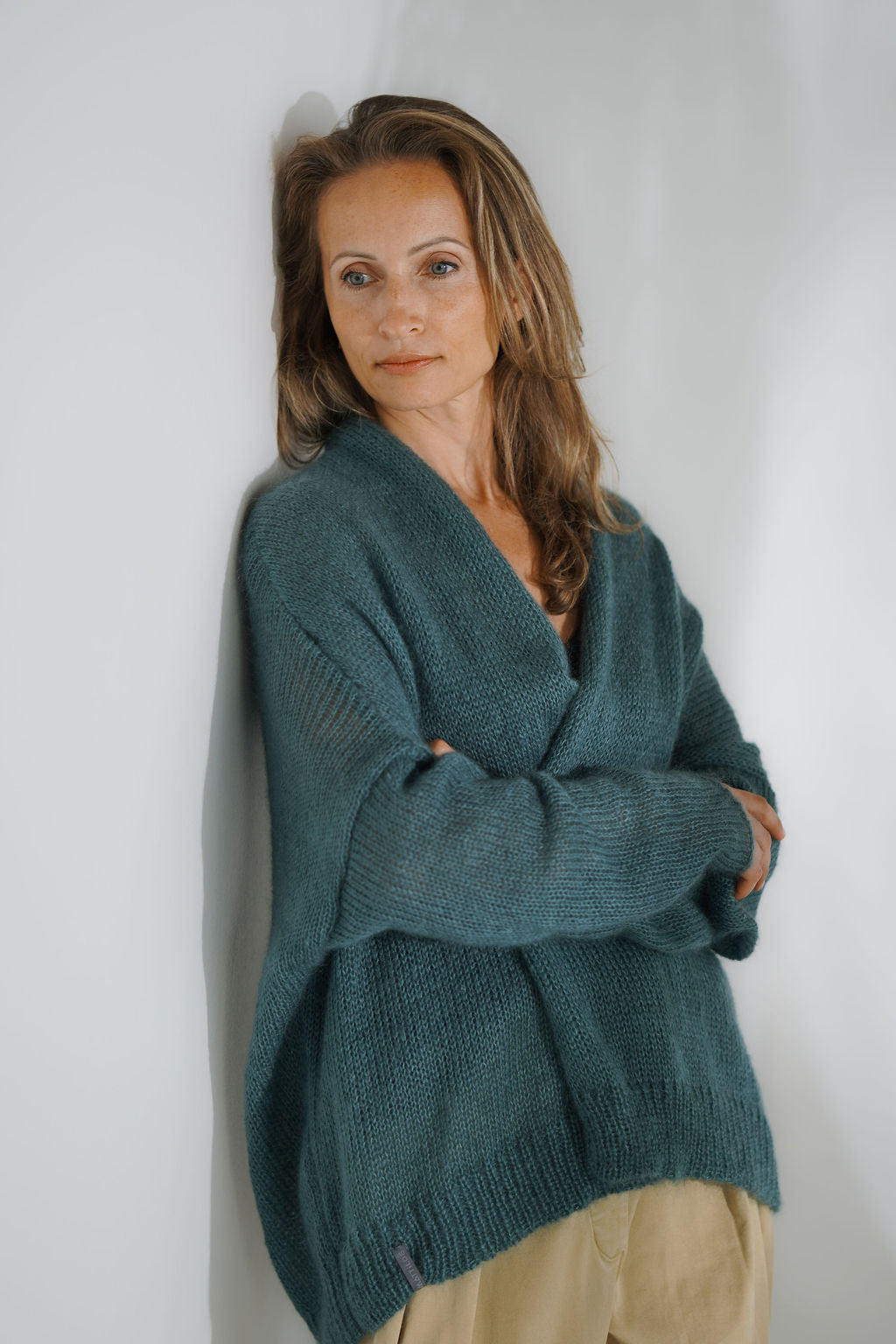 Handcrafted teal kid mohair and silk short cardigan