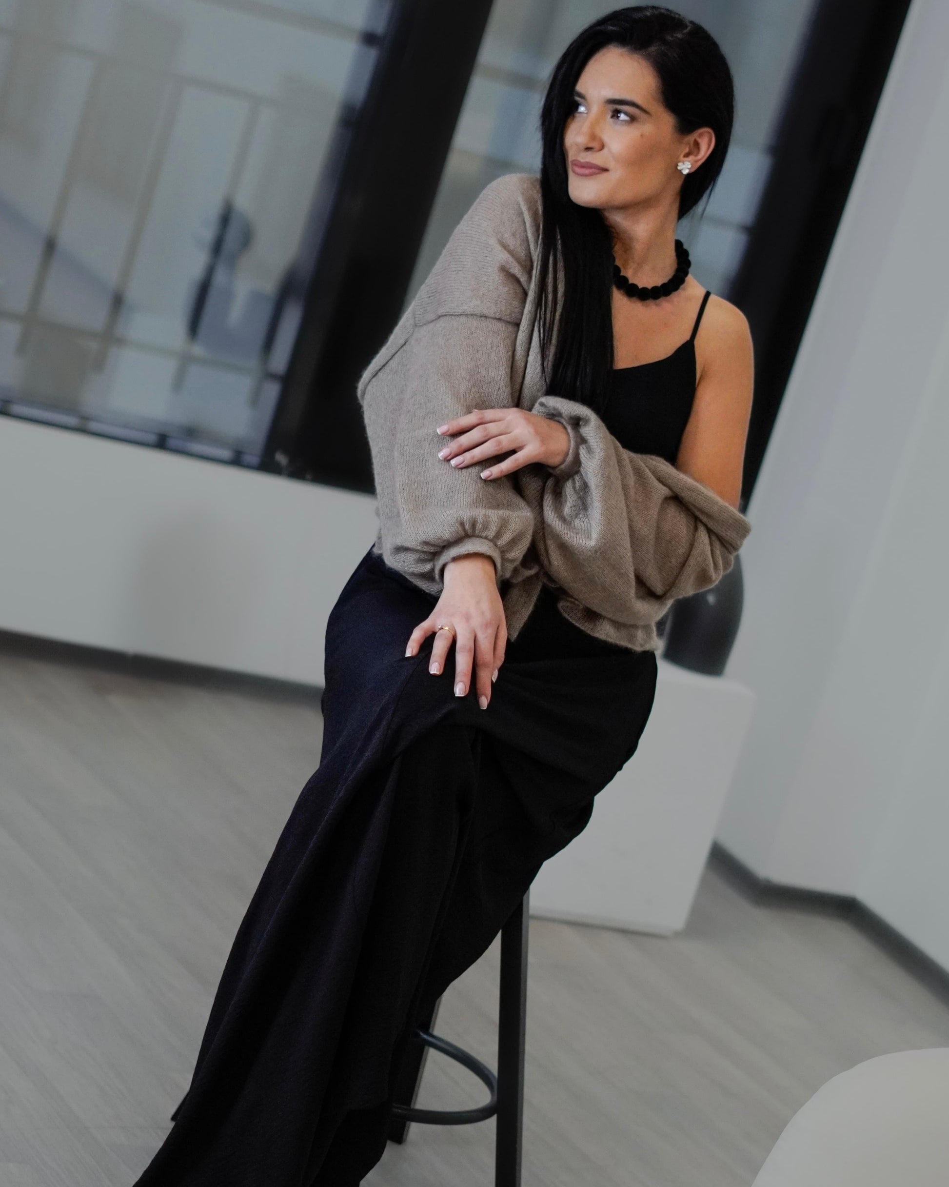 Black hand knitted mohair cardigan with a decorative back seam